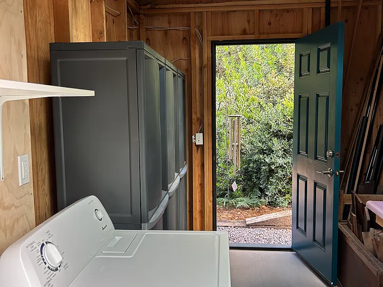 Laundry/storage shed with one other tenant