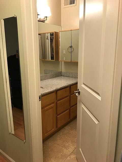 bathroom, shower over tube