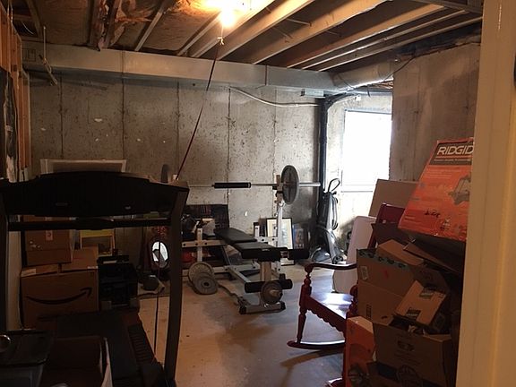 Unfinished basement room.