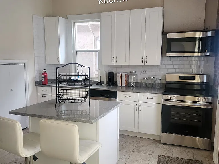Kitchen looking from laundry room.