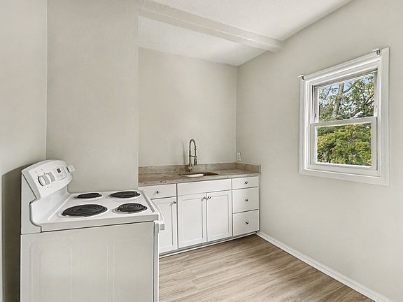 Kitchen with refrigerator and stove/oven
