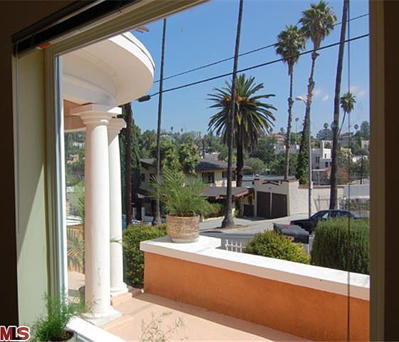 Entrance through the elegant front porch.