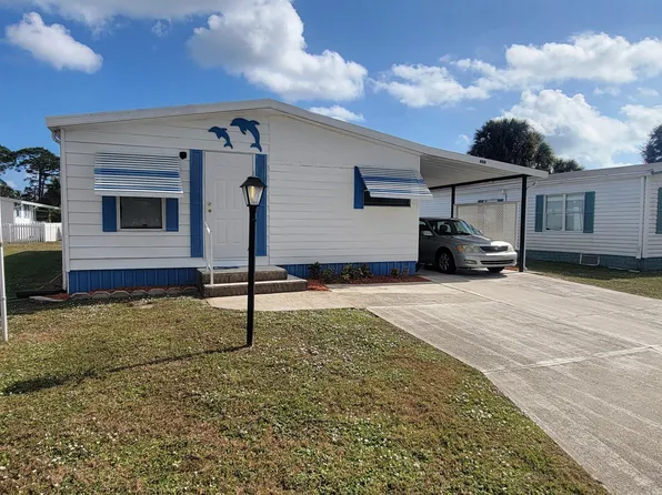 480 Dolphin Cir, Barefoot Bay, FL 32976