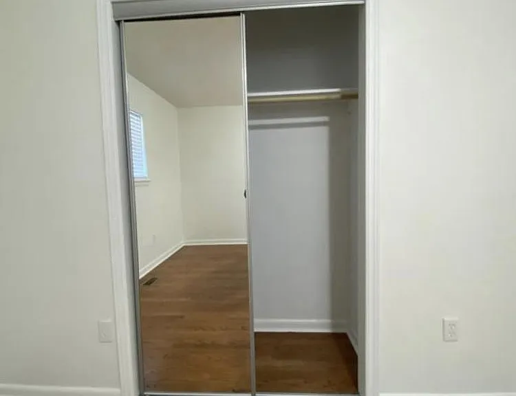Mirrored doors on master bedroom closet