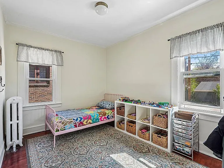 Third bedroom, north and east facing windows. Pictured here as a solo kid's