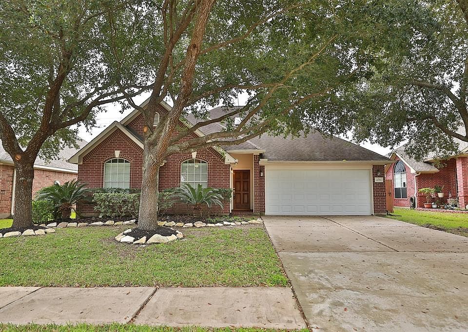 This Plantation built beauty even has great curb appeal with beautifully landscaped treed front yard!