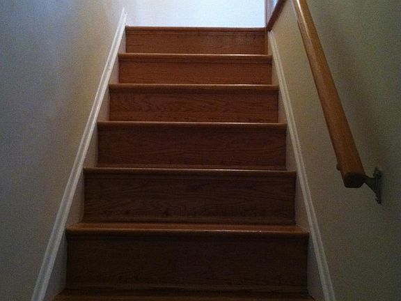 Finished hardwoods on stairwell.