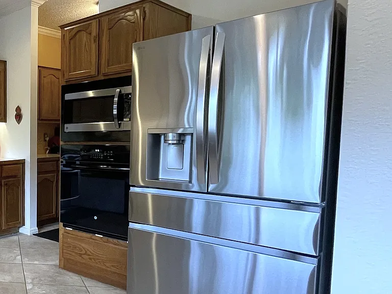 Refrigerator features flex drawer, two icemakers that provide 3 ices - cubed, crushed and craft.