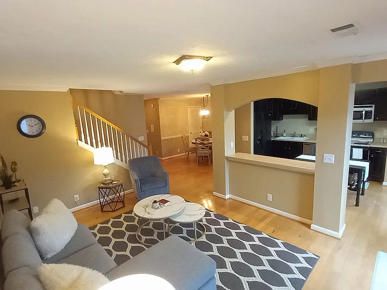 View from living room to kitchen and dinning room areas - spacious