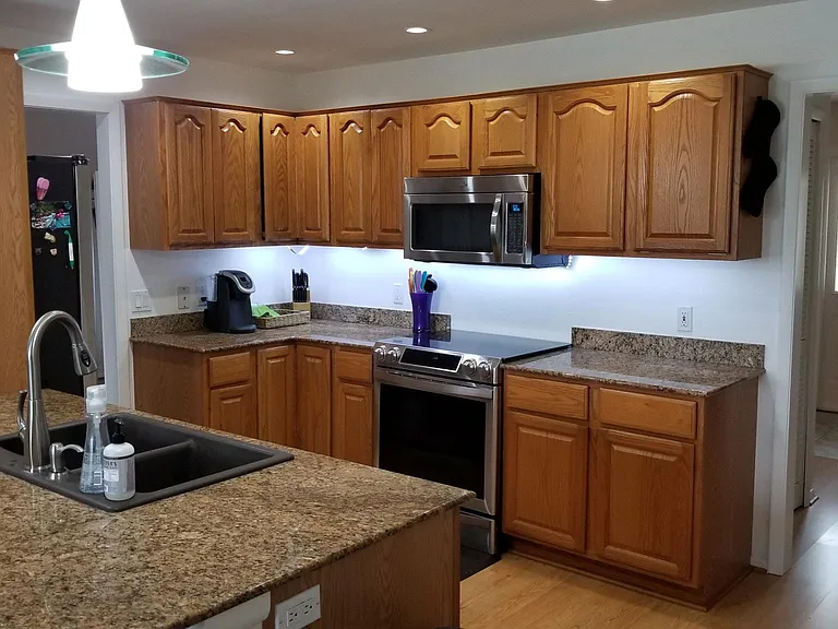 NEW PHOTOS COMING SOON.
OLD photo! Recently remodeled. Fully updates Kitchen/Bath and furniture. Kitchen is now white shaker cabinets, white quartz countertop and with large island seating
