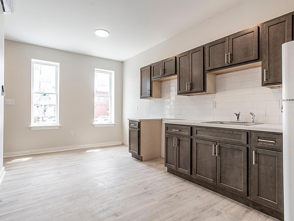 Kitchen includes stove and Fridge