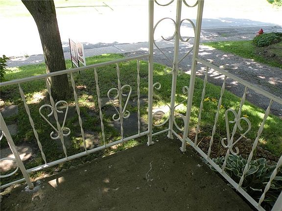 Freshly painted front porch railing.