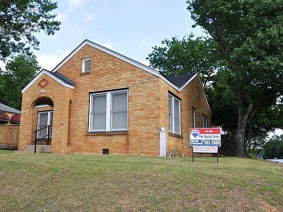 "Corner lot with mature trees"