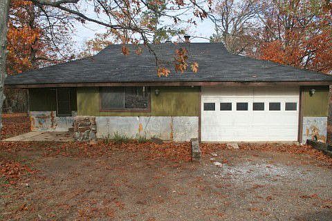 Home needs some rock work on the outside.