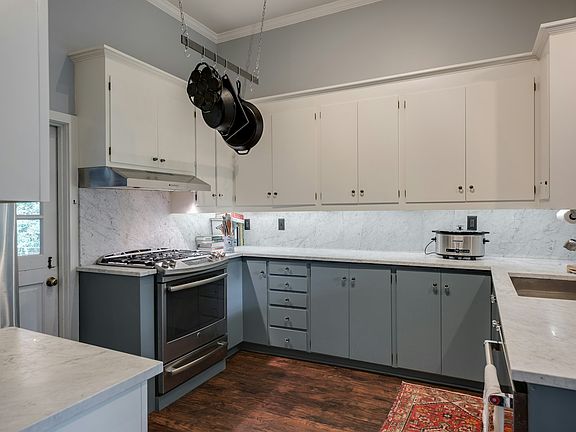 Updated Kitchen w/ tons of storage and walk-in pantry.