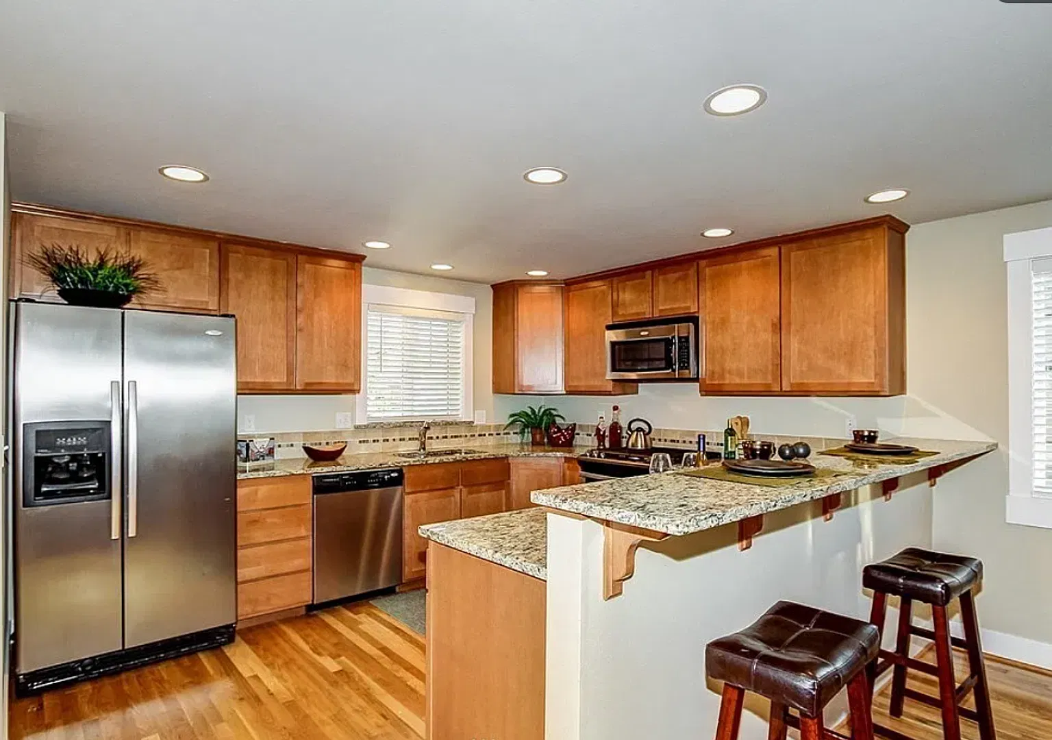 Updated Central District Townhouse with Attached Garage & Private Yard! — Photo 4
