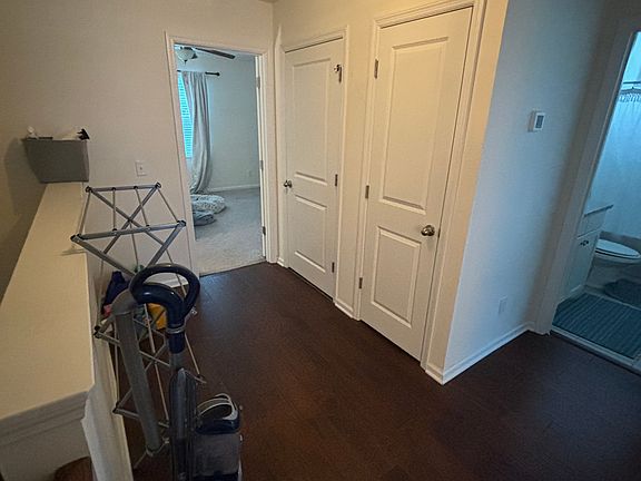 Large hallway, linen closet and washer/dryer
