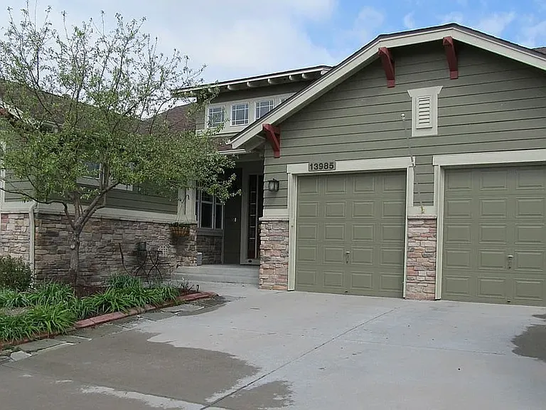 13985 W 86th Dr — Photo 1