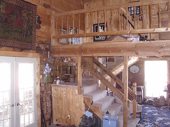 back door and steps to loft