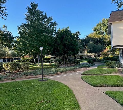 Walkway path on the greenbelt leading to home