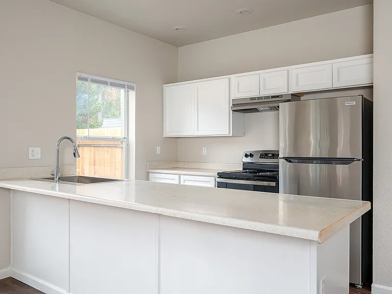 Two Bedroom One Bath | Kitchen with Countertop Seating