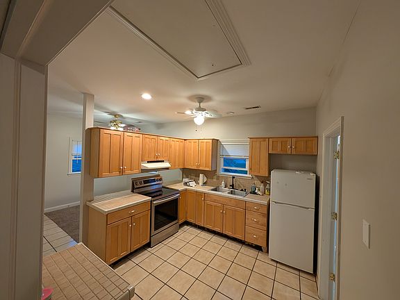 Kitchen view from bedroom entrance