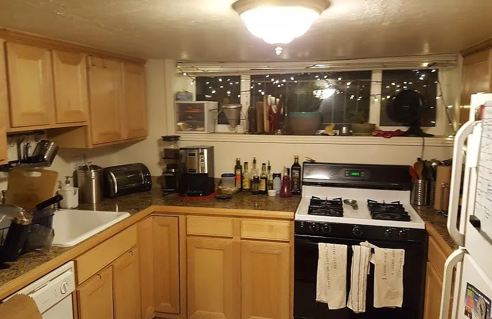 Granite countertops, gas stove, pecan cabinets, fullsize ref
