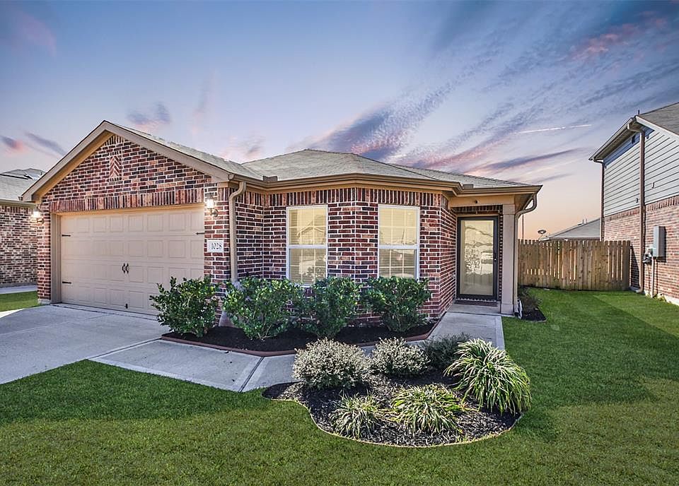 Welcome home to 1028 Western Rose Drive in Freeman Ranch! This charming home offers great curb appeal with its lush and well maintained landscaping.