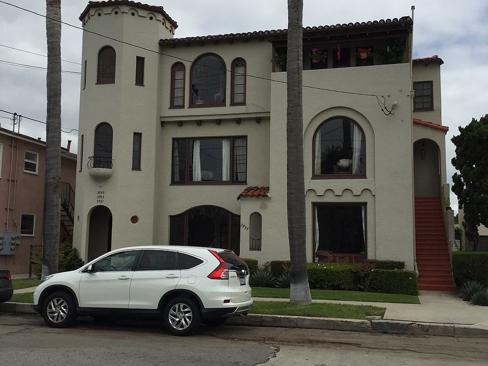 Front of building, apt is located in back of property above storage rooms.
