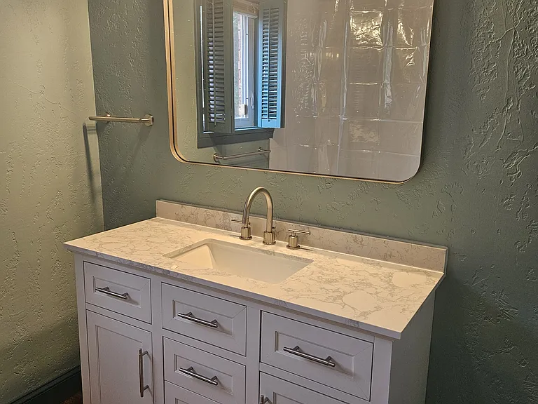Newly remodeled bathroom with shower/tub.