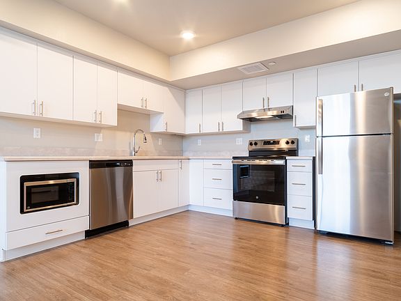 Kitchen with abundant cabinet space - One-Bedroom unit