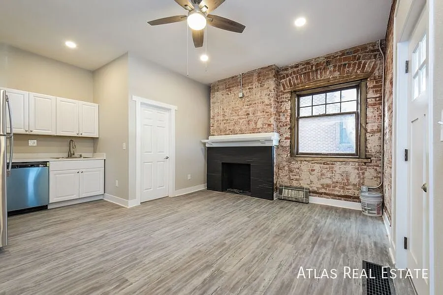 Building Photo - 1220 N Corona St #7
