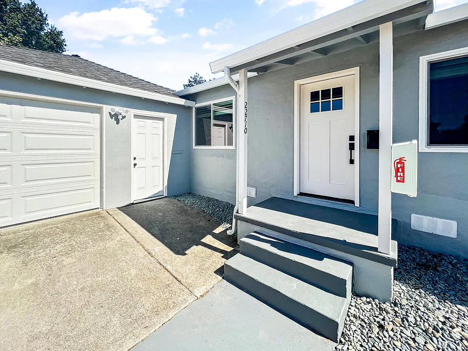 Front Exterior with 1-Car Garage