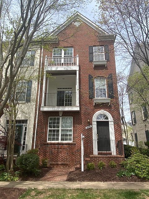 Stunning renovated brick King Farm end-unit townhome!