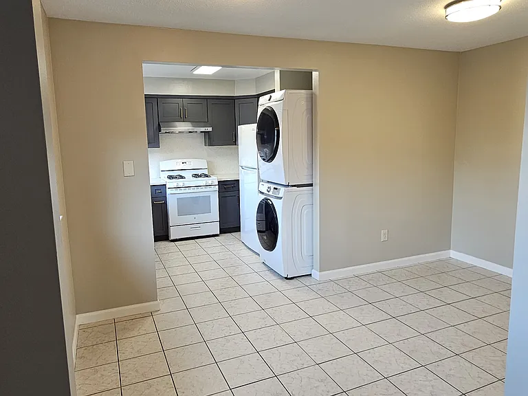 Dining area leading to kitchen