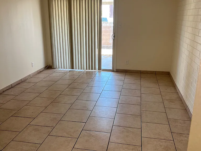 Living Room with sliding doors to the private covered patio