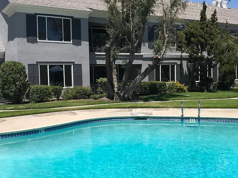 Ground floor , end unit condo overlooking pool and courtyard
