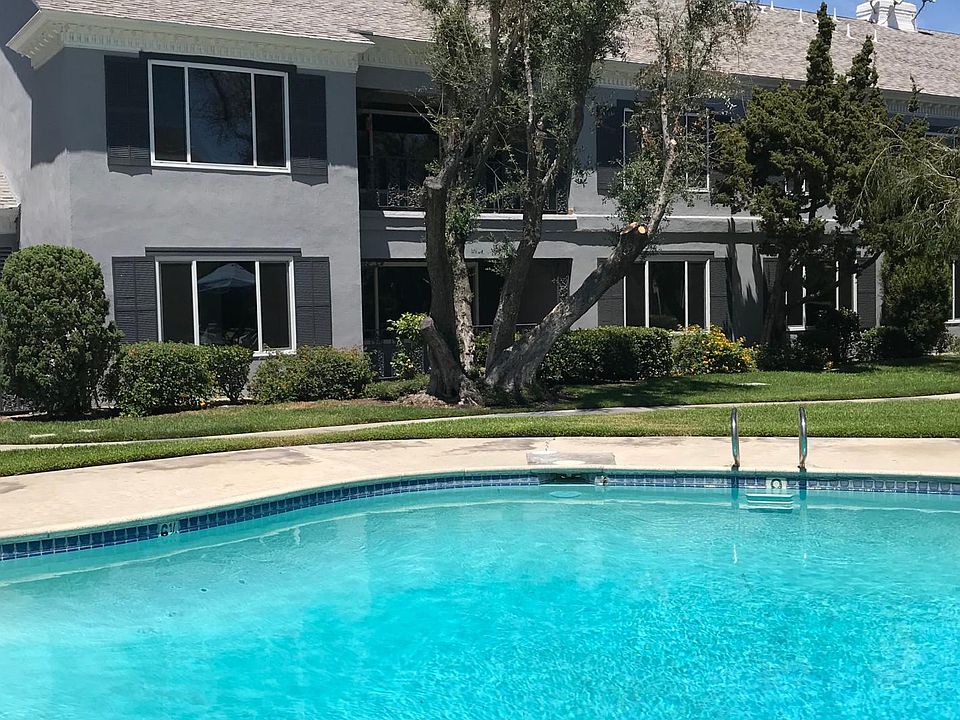 Ground floor , end unit condo overlooking pool and courtyard