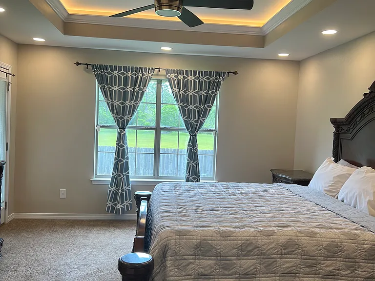 Owner Suite Bedroom with recess, lighting, as well as a coffered lighting in the Crawford ceiling
