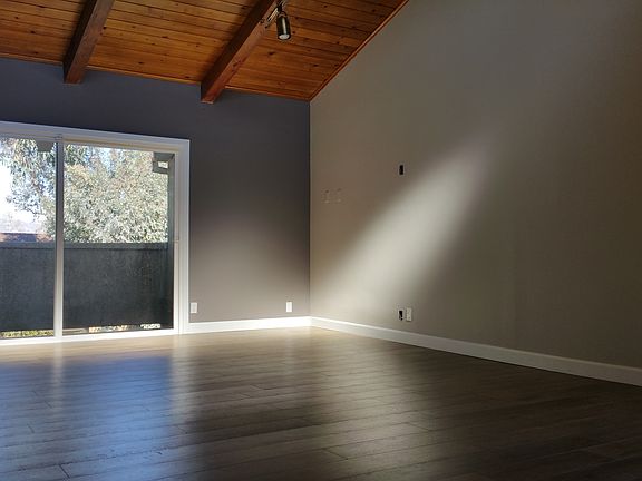 Living room with vaulted ceilings