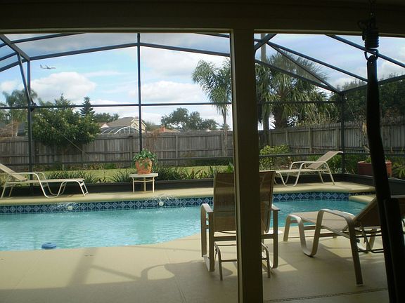 covered patio by pool