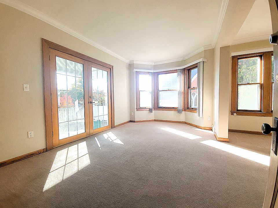 Light filled living room with bay window
