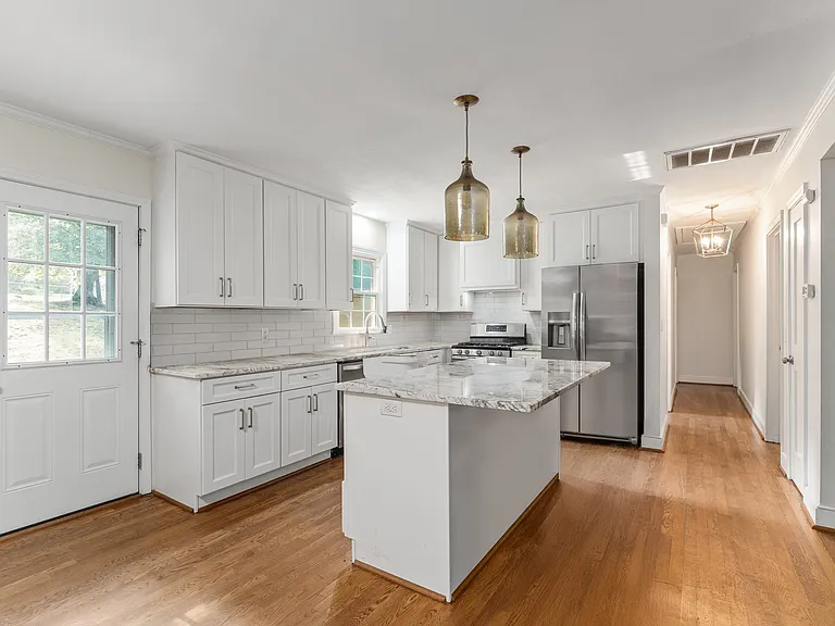 Hardwood floors throughout have been recently refinished.