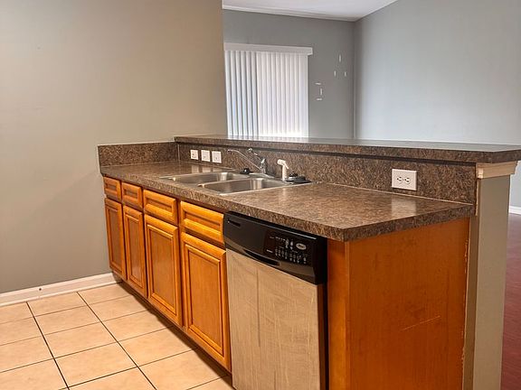 5th image of 6984 Ortega Woods Dr Unit 8-11