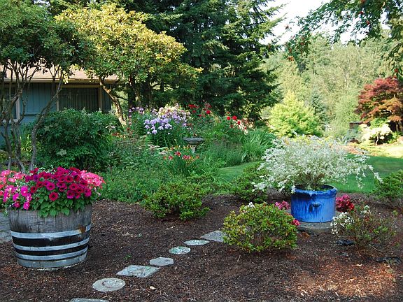 Enjoy this sweeping territorial view from the lush front gardens.