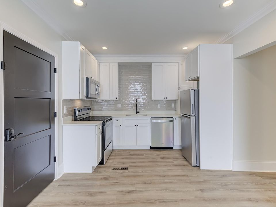 Kitchen opens to living room