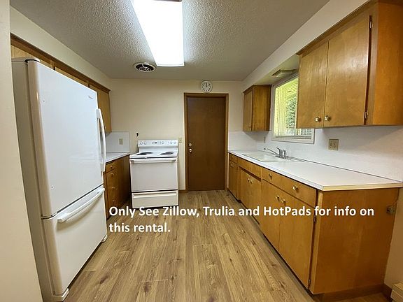 Kitchen w/ Full Sized Refrigerator