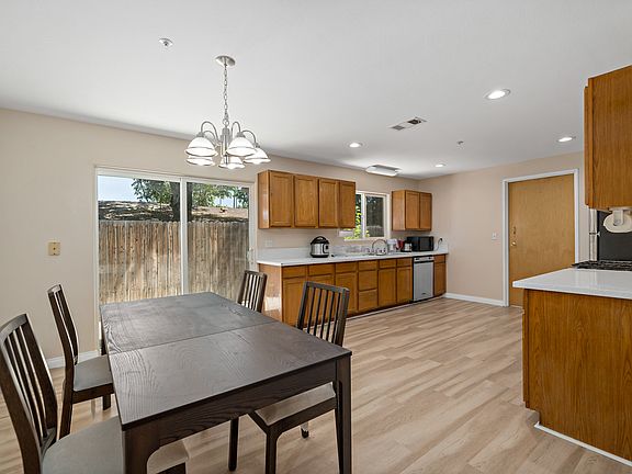 Walk into the open kitchen/dining area, designed for your comfort and relaxation!