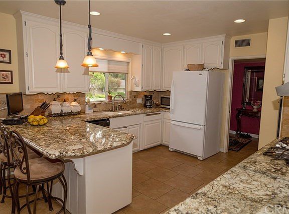 Updated Kitchen with Granite Counter Tops