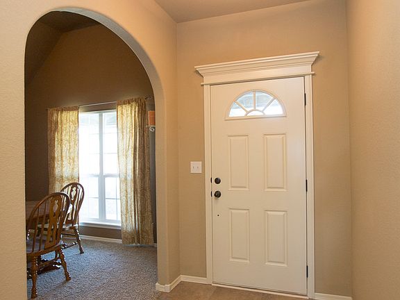 Tile Entryway Leads to Arch Opening